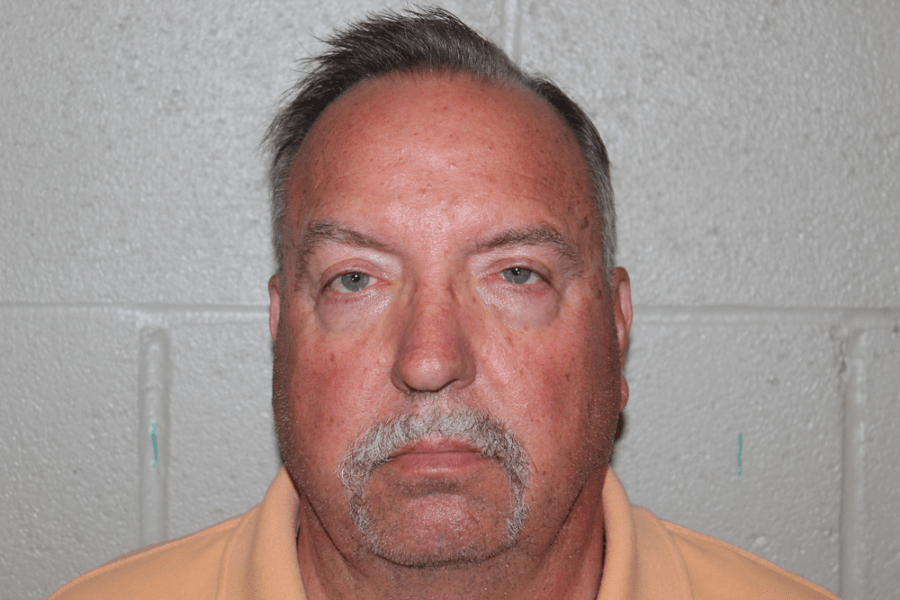 Benton County treasurer charged of child enticement using Grindr