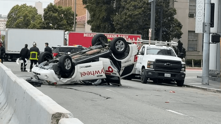 Crash flips taxi on its roof in San Francisco