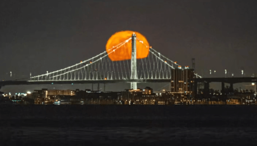 Timelapse: ‘Pink' full moon rises over the Bay Bridge