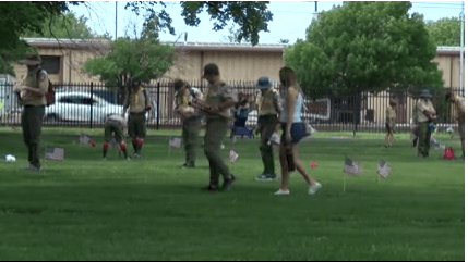 ABQ Boy, Girl Scouts place American flags on veteran headstones for Memorial Day