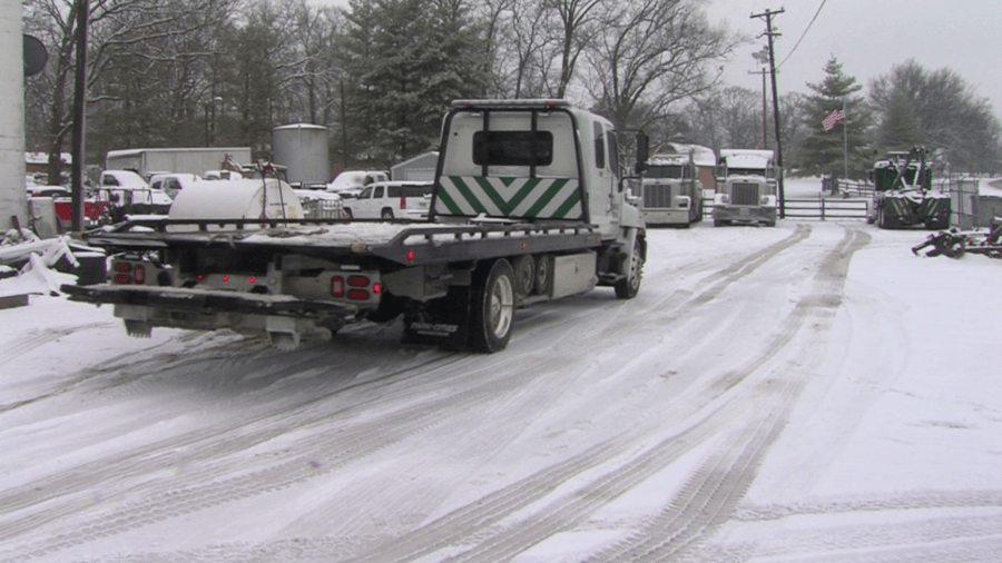 Tow truck operators stay busy as winter weather hits roads