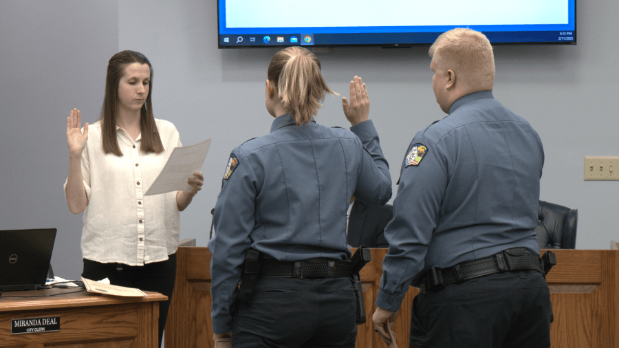 Swearing in ceremony for two new Carthage police officers.