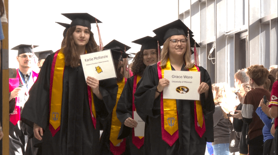 Carl Junction seniors revisit old halls in caps and gowns