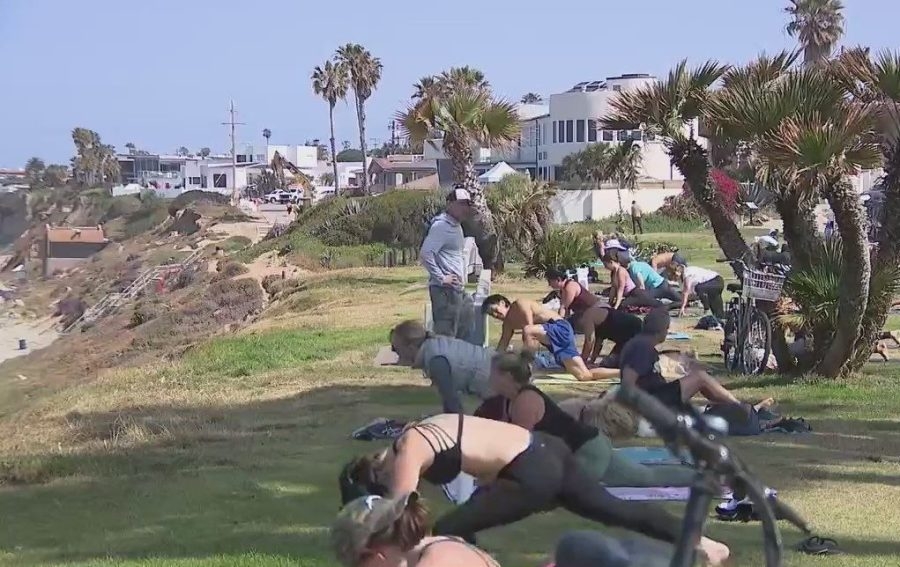 City blocked from applying vendor laws to beachside yoga classes