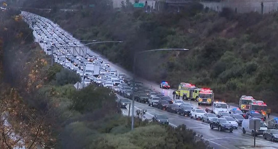 Multi-vehicle crash gridlocks I-8 traffic as rain wets roadway