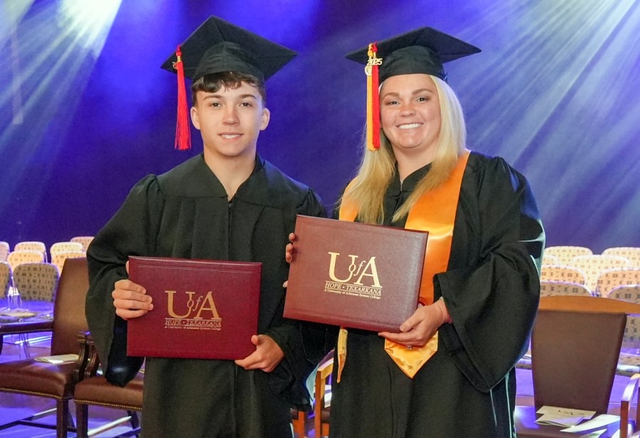 Mother overcomes challenges to graduate with son at UAHT