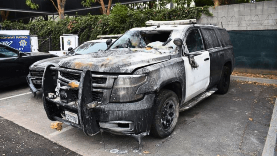 Los Angeles protester arrested for allegedly lighting CHP car on fire