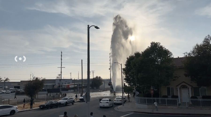 Sheared hydrant soaks high-voltage power lines in San Fernando Valley