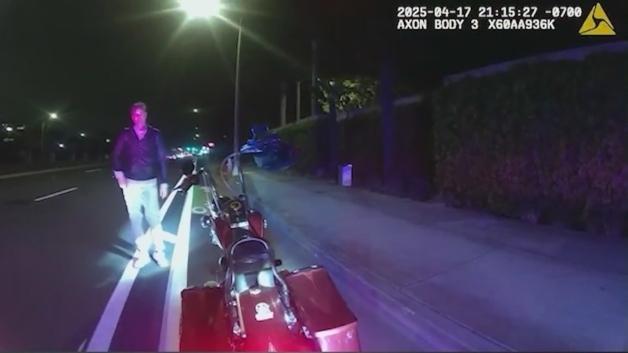 Dashcam video shows police open fire on motorcyclist in Orange County