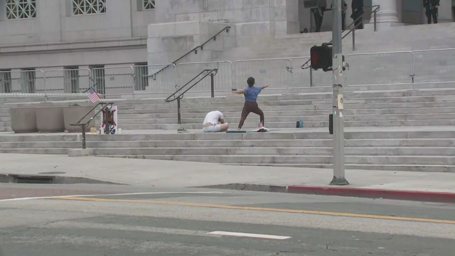‘No Kings' protests begin in Los Angeles with…yoga?