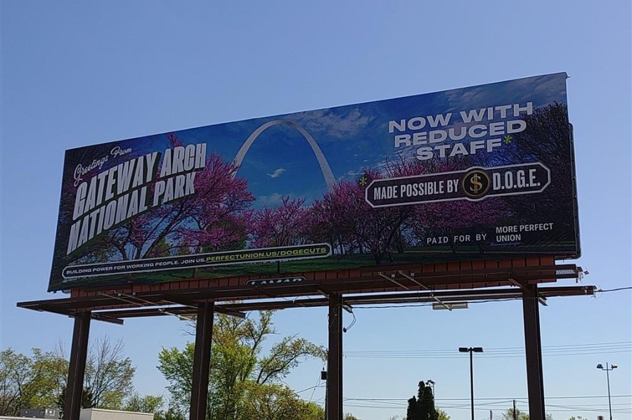 Billboard featuring Gateway Arch protests cuts to National Parks