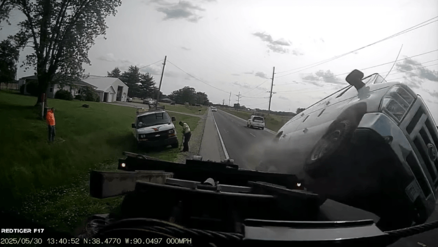 Van goes airborne, flips, and narrowly misses others near Columbia, Illinois