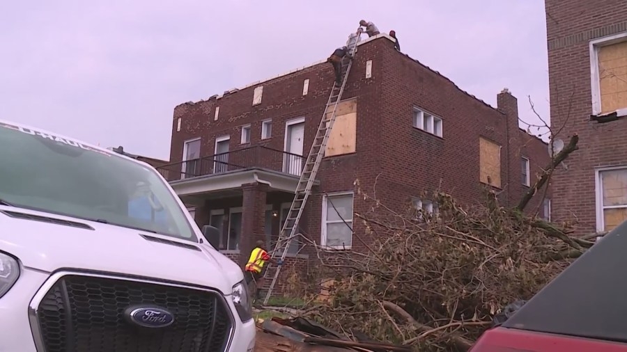 Local heroes fix roofs in tornado-ravaged neighborhoods