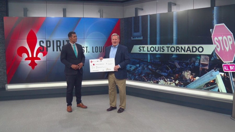 FOX 2-St. Louis 11 GM and VP presents donation towards storm recovery
