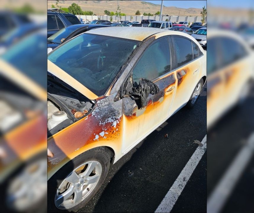 Crews extinguish fire after several cars ignite in parking lot