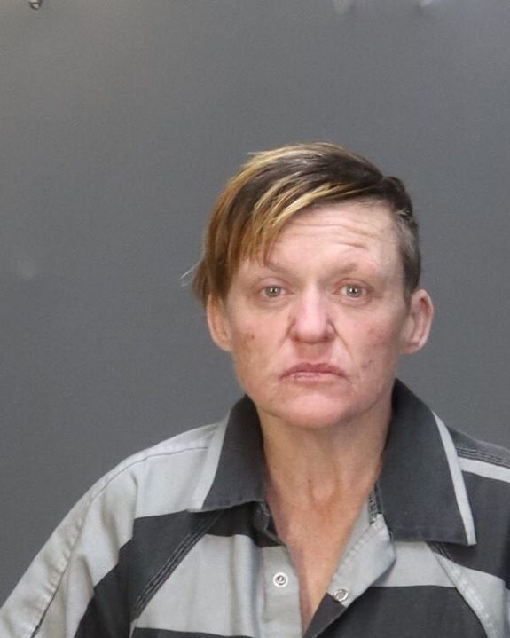 Woman accused of setting a fire in homeless camp