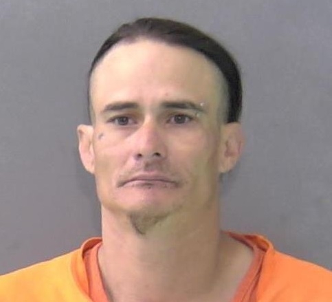 Man with multiple warrants taken into custody