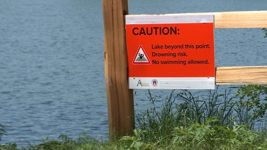 Why are CapTex Triathletes allowed to swim in Lady Bird Lake?