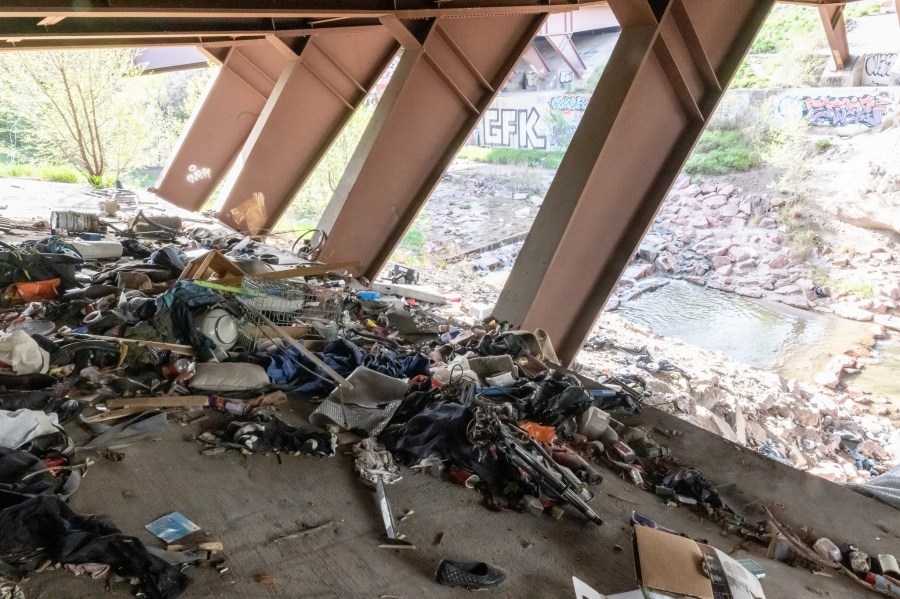 Tapping of I-25 lights discovered during camp cleanup