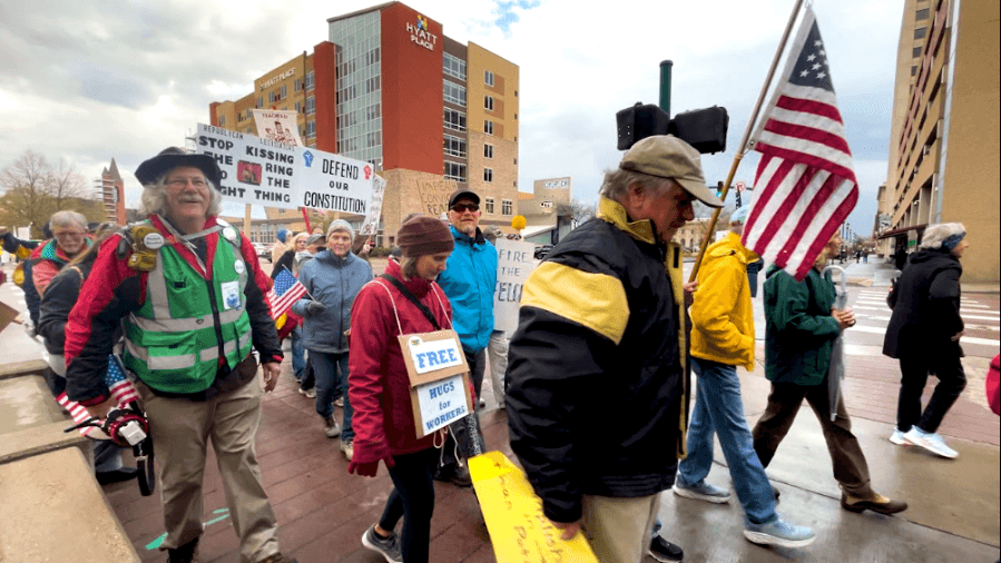 Unions urge workers to fight back against mass firings