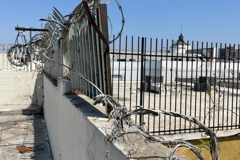 'Living in misery': Doctor pleads with authorities to address rooftop homeless encampment