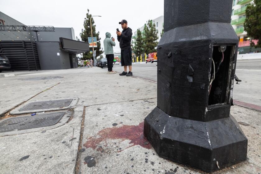 Driver rammed into crowd outside Hollywood club, then was shot. Alleged shooter now under arrest