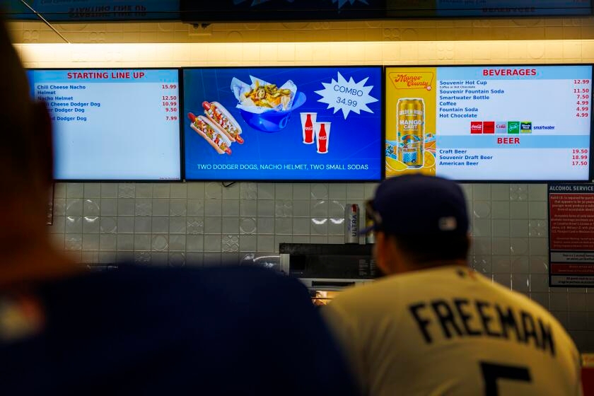 The Dodgers sell hot dogs for $7.99. The Diamondbacks sell them for $2.99. Why?