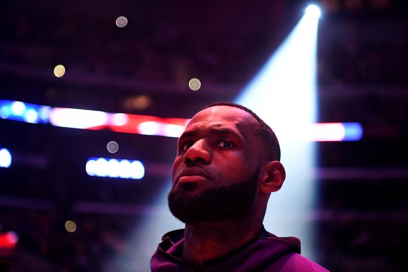 Plaschke: Kobe Bryant has one more lesson for LeBron James — how to retire