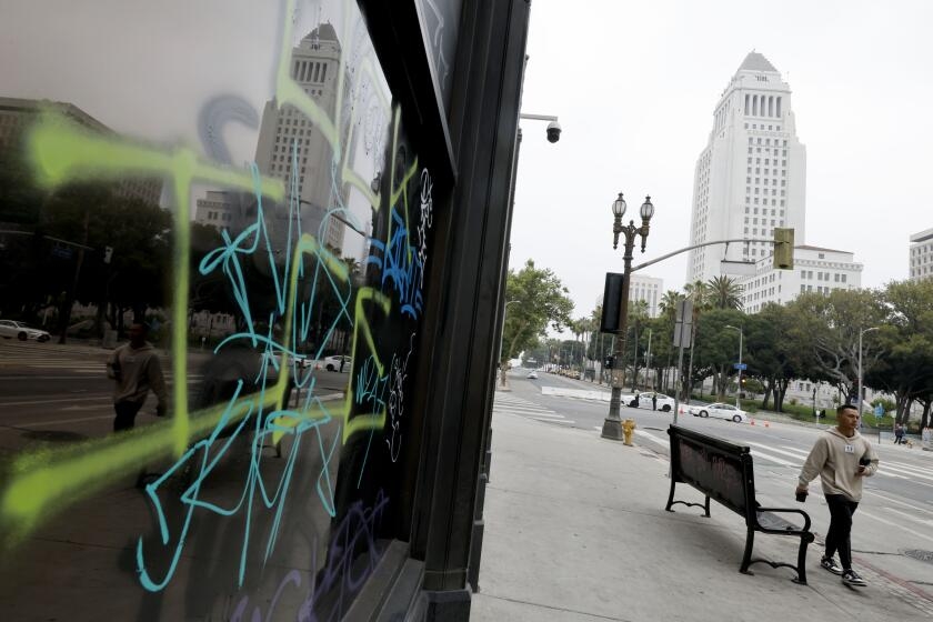 Downtown Los Angeles vandalized after protests. 'It's kind of the usual,' residents say