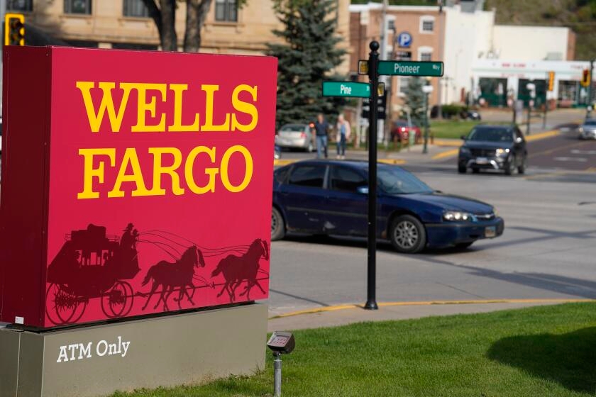 Fed removes restrictions on Wells Fargo after fake-accounts scandal