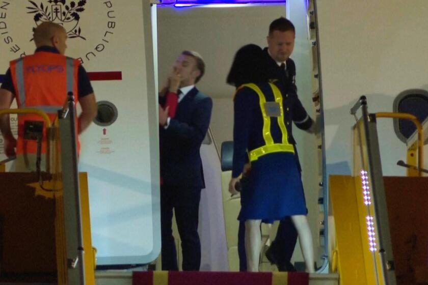 Abcarian: Was Le Slap a love tap or an assault? France's first couple offer a distraction from bad news