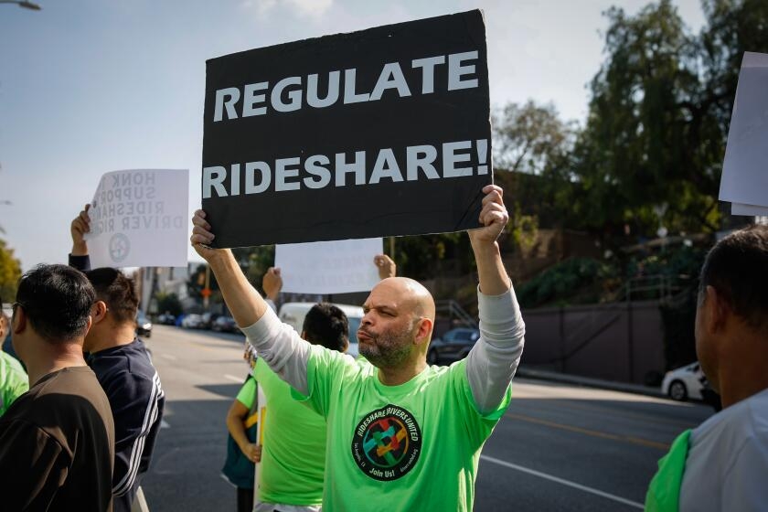 California in settlement talks with Uber, Lyft over wage theft claims