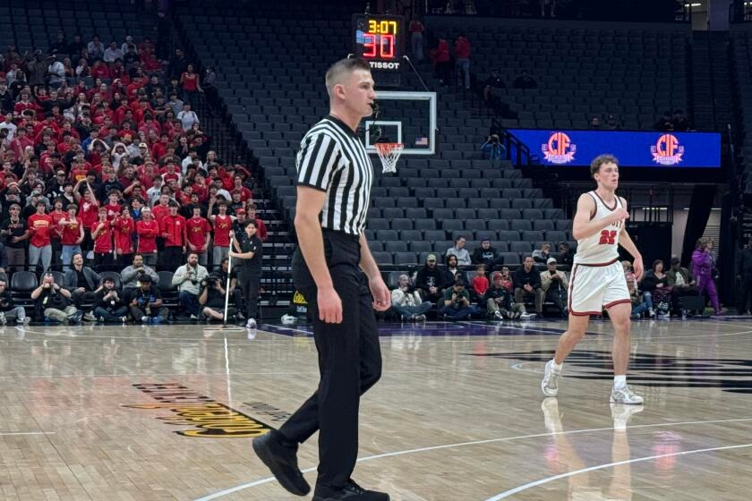 Prep talk: Like father, like son. Drew Spooner officiates first state basketball final