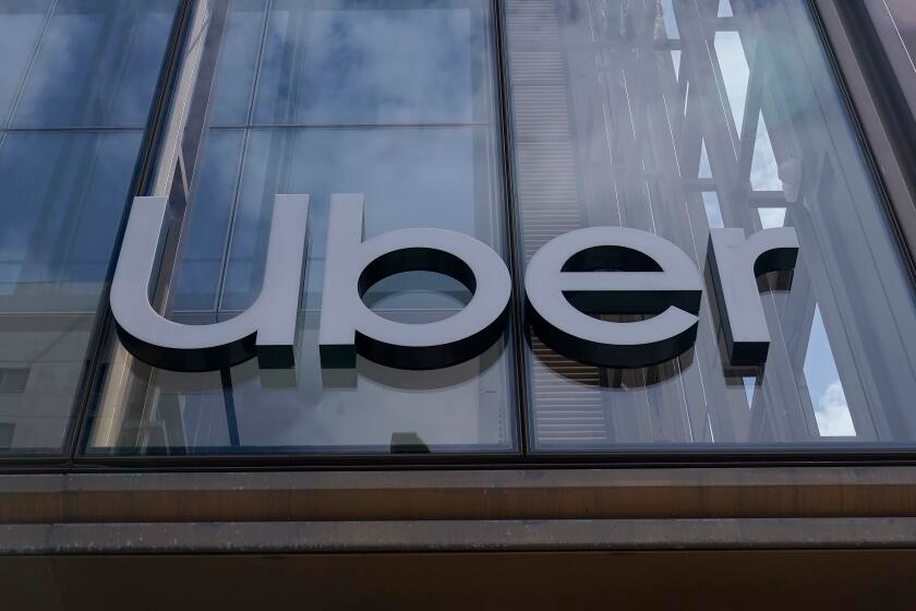 Uber targets commuters with cheaper pooled rides, price-lock pass