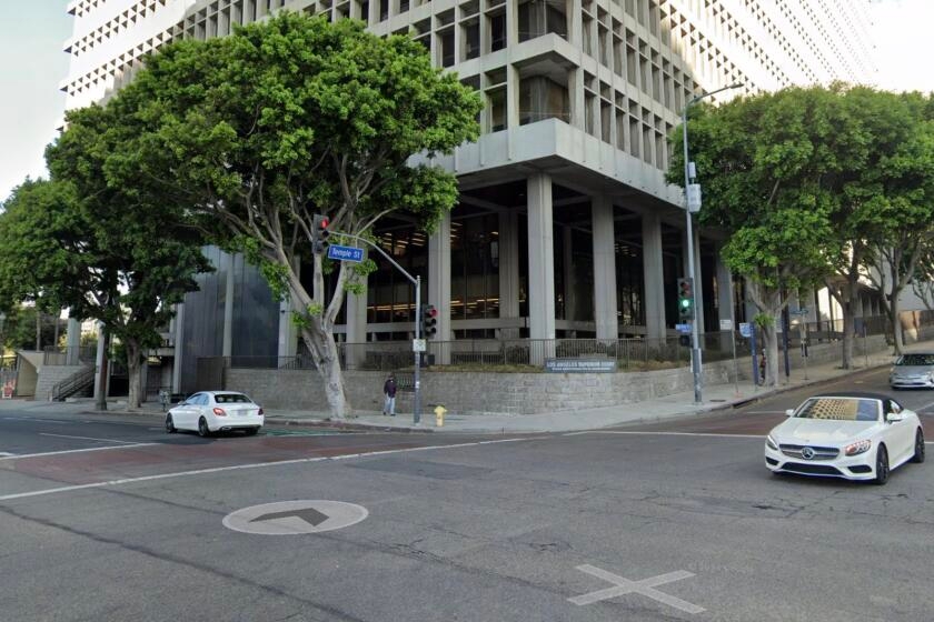 Sheriff's deputies flee moving truck as man hijacks department vehicle in downtown L.A.