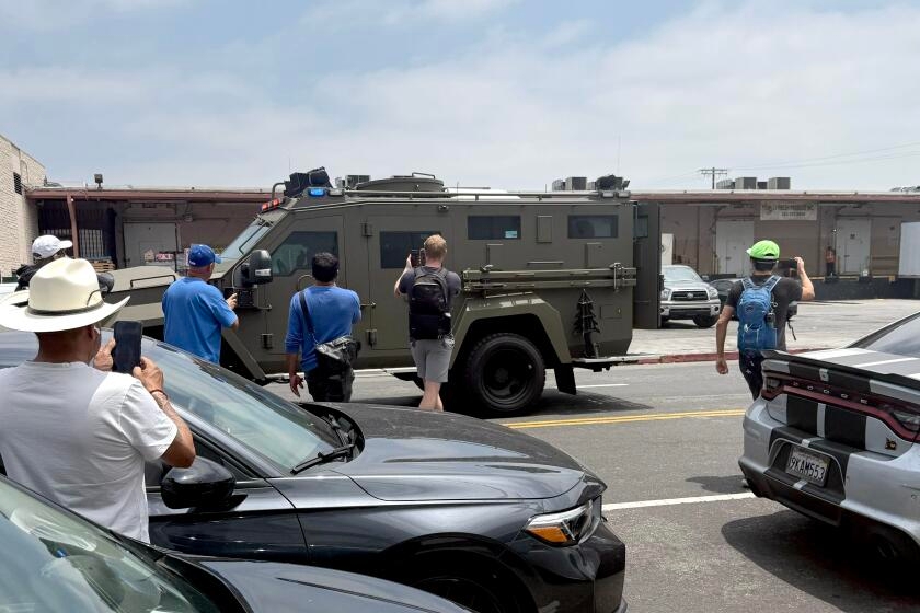 Multiple immigration sweeps reported across L.A., with a tense standoff downtown