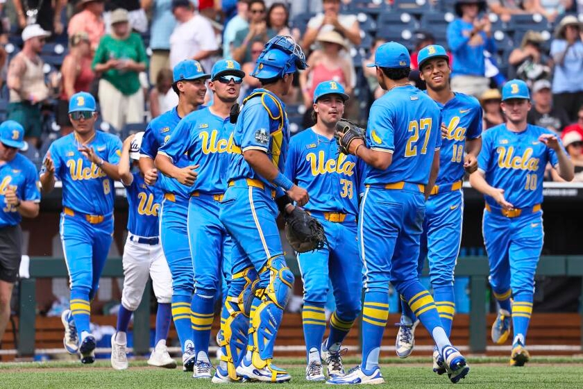 UCLA versus LSU Men's College World Series game suspended until Tuesday