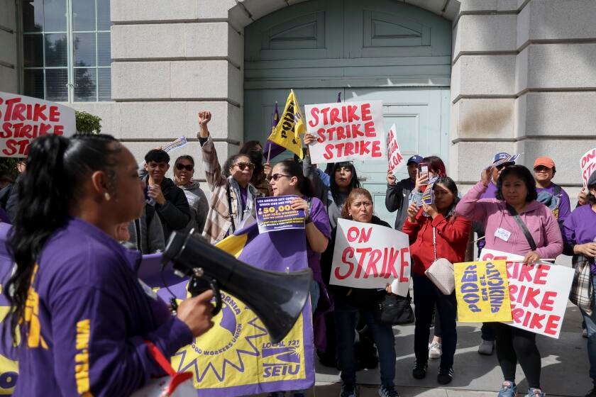 L.A. fast food workers call on city officials to approve 'fair work week' law