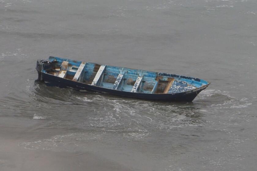 Dad in coma, son dead and 10-year-old daughter missing after migrant boat capsizes; 5 charged