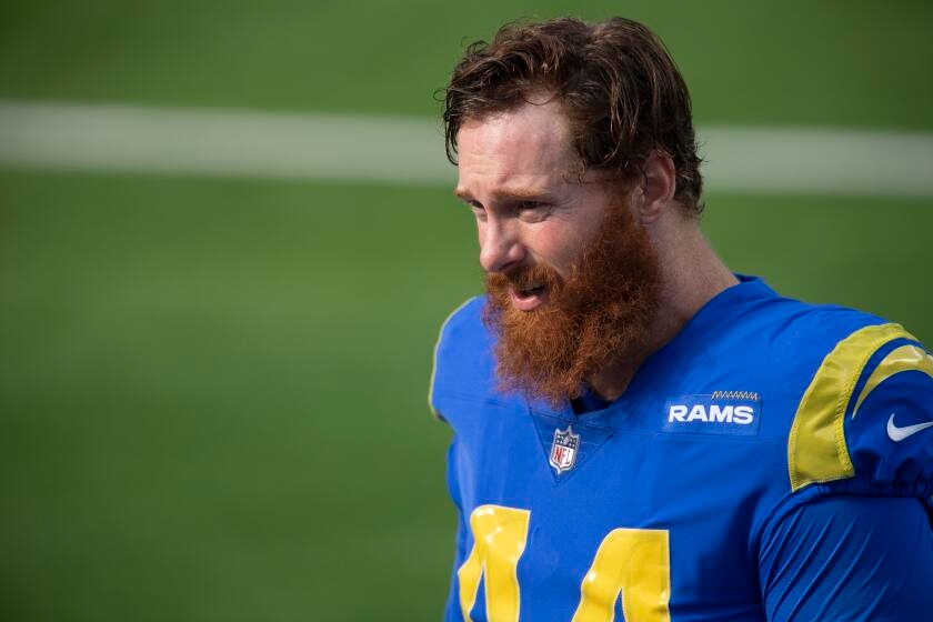 Ex-Rams long snapper Jake McQuaide disrupts church by demanding answers in porn scandal