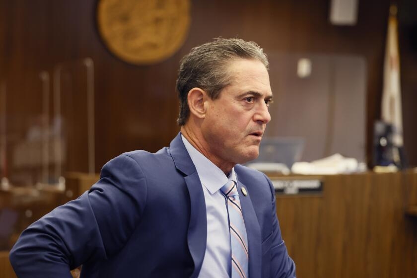 Orange County D.A. says his workplace was a miserable 'lions' den,' in court testimony