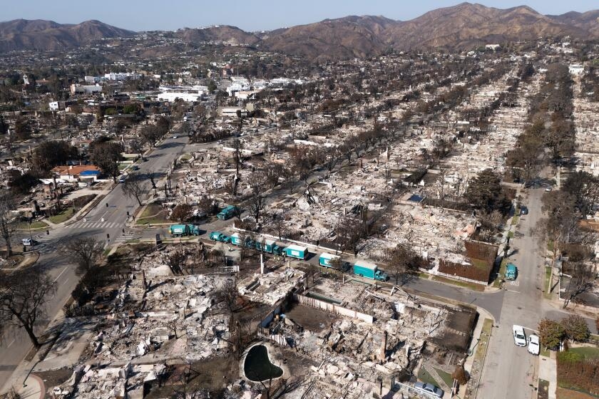 Their homes burned in wildfires. Fraudsters took their disaster relief funds, feds say