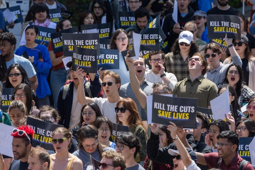 Their work in peril, UCLA researchers decry Trump administration funding cuts at protest