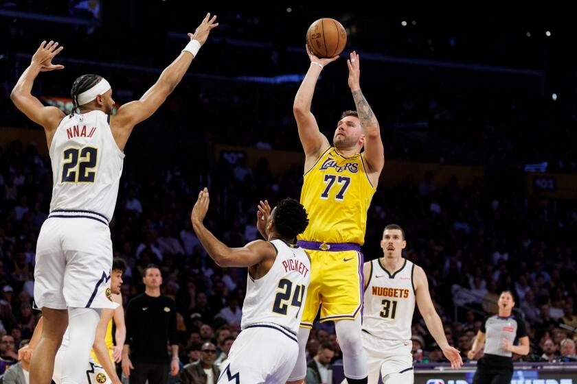 Luka Doncic's hot first quarter sparks Lakers to win over short-handed Nuggets