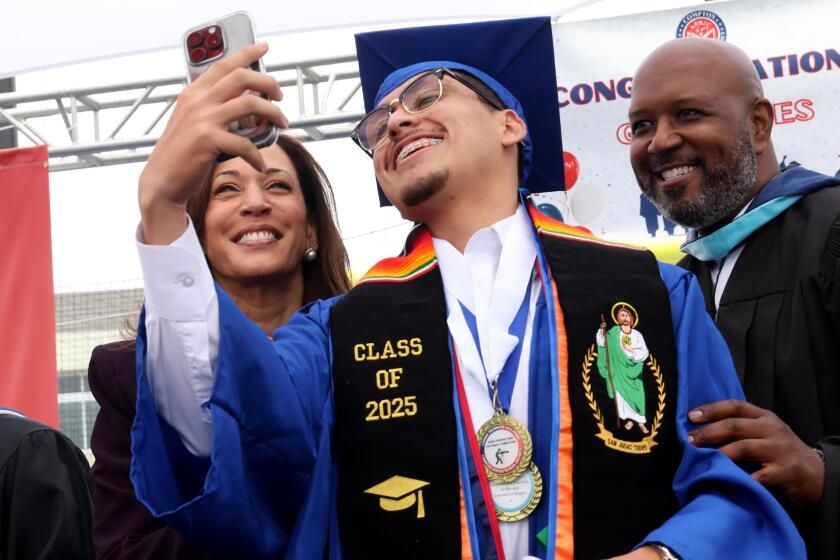 Their political futures uncertain, Newsom and Harris go on the road to Compton to feed young dreams