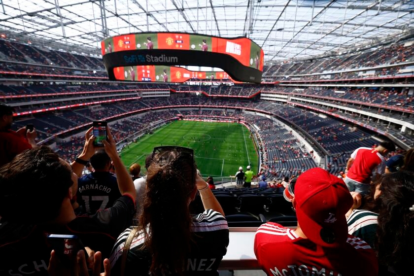 With FIFA World Cup one year away, fans and politicians still aren't sure what to expect