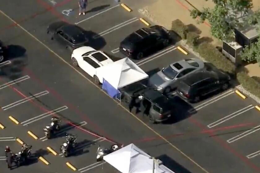 15-year-old dies after being pinned by car at Studio City school, police say; 5 others hurt