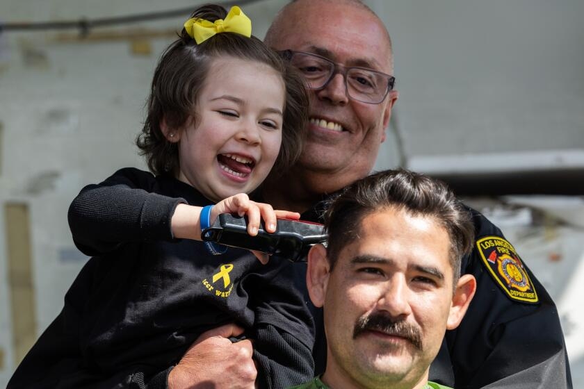 Photos: Hair goes flying at 22nd St. Baldrick's fundraiser in L.A. to fight childhood cancer