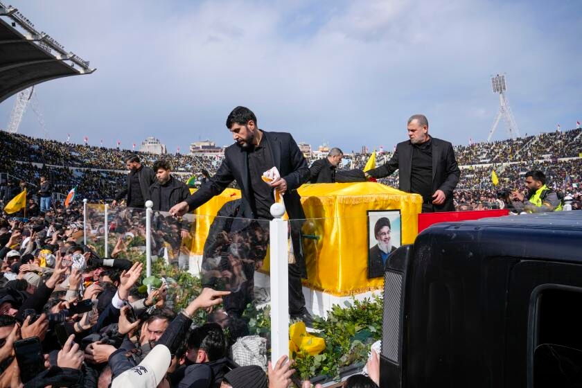 Tens of thousands attend Nasrallah funeral as Hezbollah claims it's down but not out