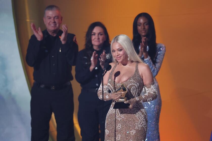 Grammys to split country album into two categories and revive album cover field